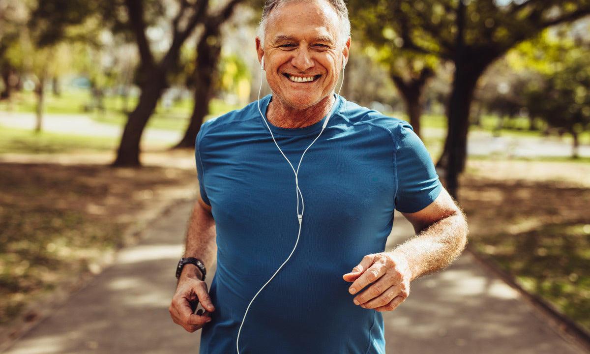 senior man running in park