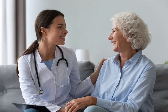 smiling patient talking to helpful and friendly medical professional