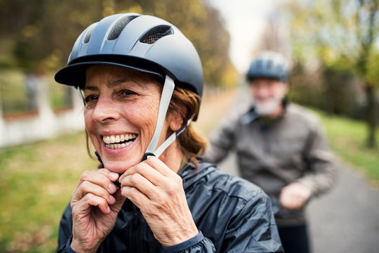 smiling woman securing bike